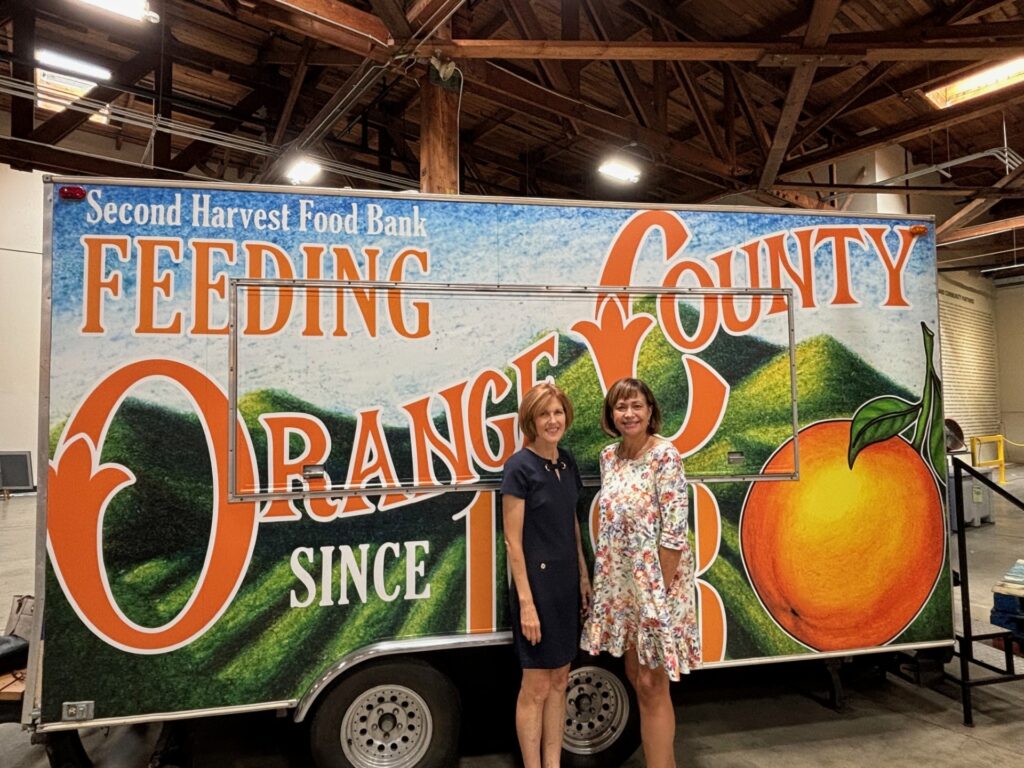 alt="Holly Hagler, Meals on Wheels OC's President and CEO and Claudia Bonilla Keller, Second Harvest CEO"